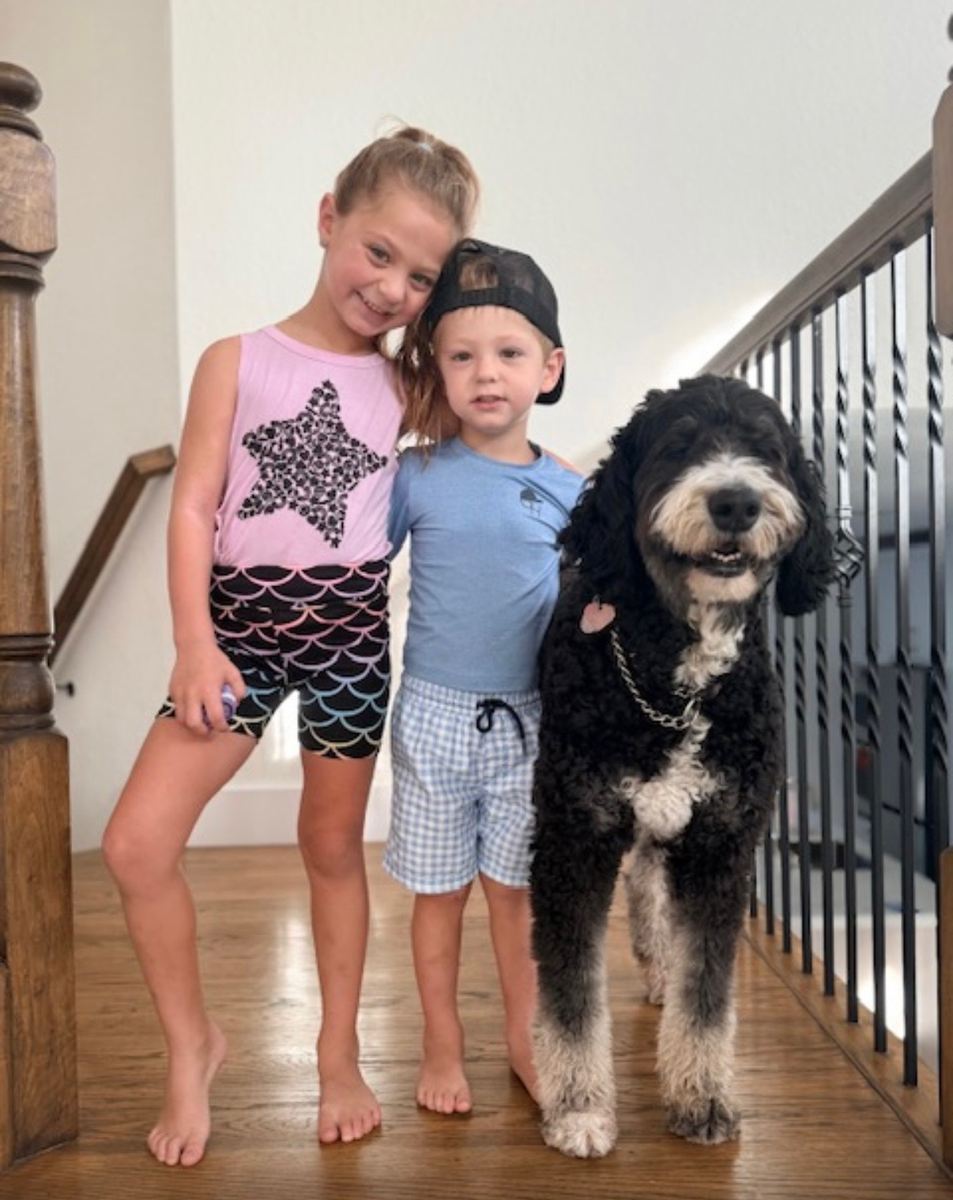 Zachary's children with their dog